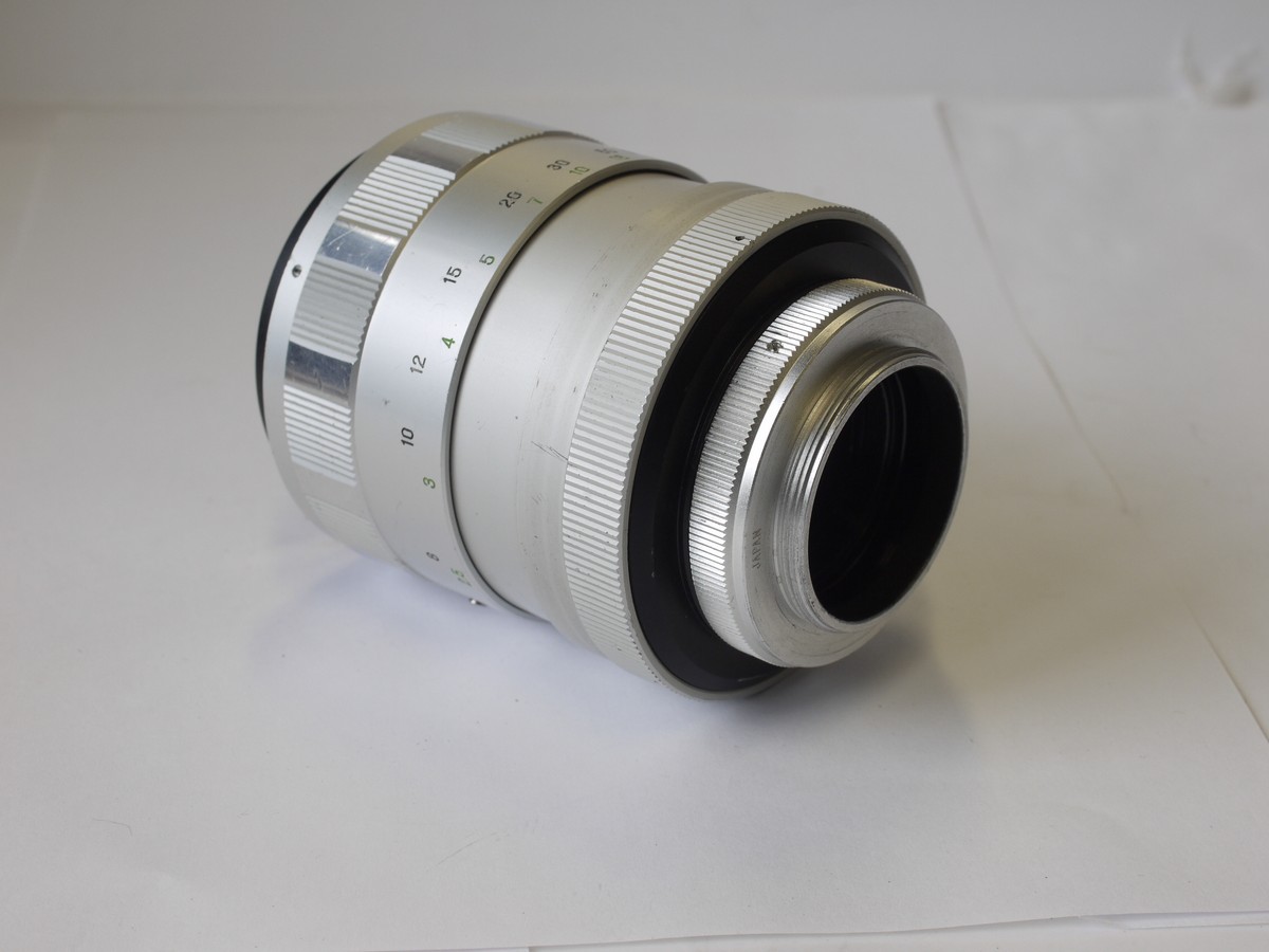 mwclassiccameras-20230526-56 Hanimex 300mm f6.3 Mirror lens, silver coloured barrel, with removable M42 screw mount + lens hood