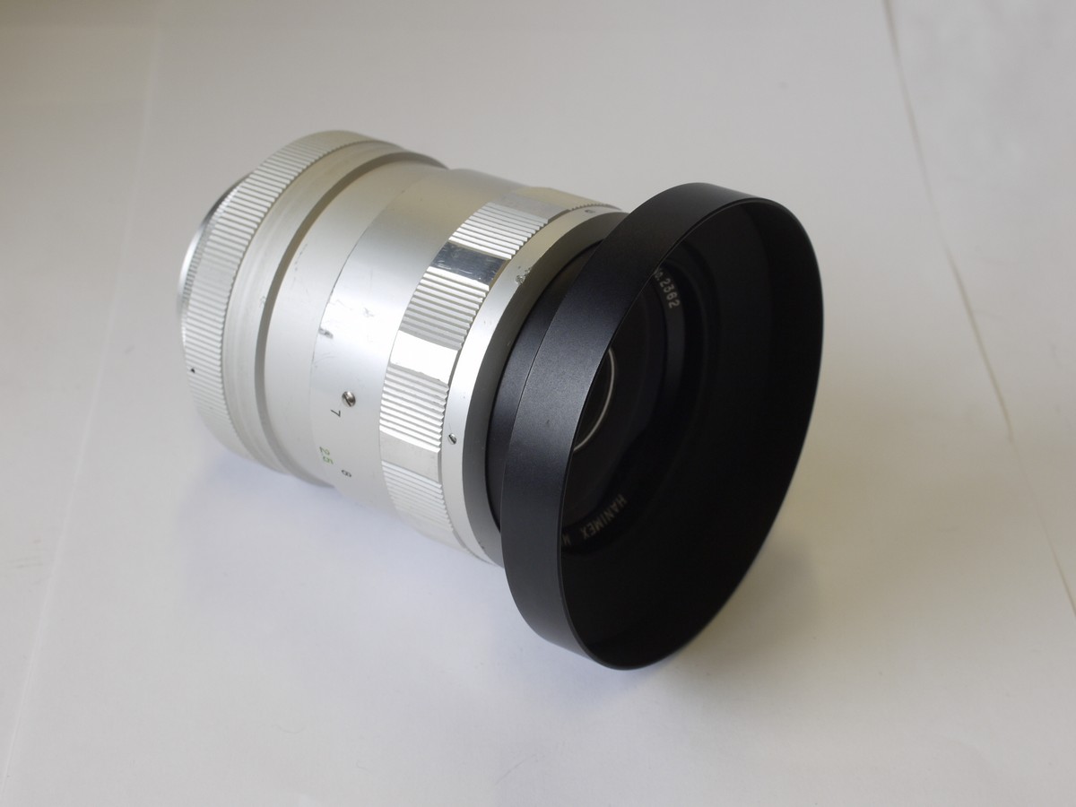 mwclassiccameras-20230526-59 Hanimex 300mm f6.3 Mirror lens, silver coloured barrel, with removable M42 screw mount + lens hood