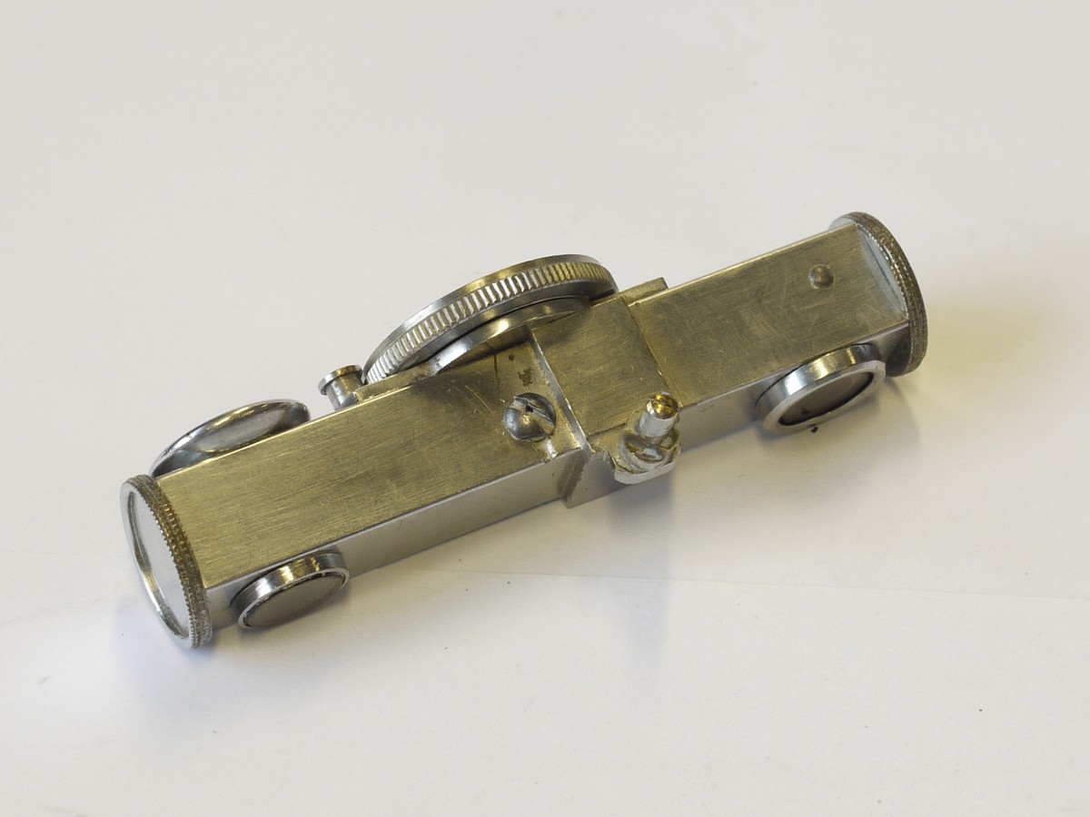 mwclassiccameras-20230616-145 Independent made short base shoe finder, all polished white metal casing, with pillar but no accessory shoe. Has built-in Yellow contrast filter. Scale in Metres. Copy of Leitz FOKOS
