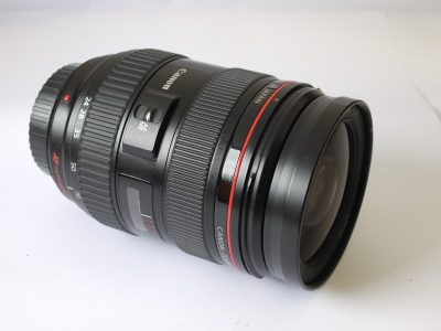 Canon EF 24-70mm f2.8 L USM lens, with Hoya Skylight filter, Canon caps, EW-83F bayonet lens hood, LP1219 pouch case, instructions & makers box