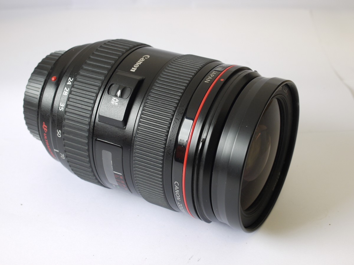mwclassiccameras-20230623-104 Canon EF 24-70mm f2.8 L USM lens, with Hoya Skylight filter, Canon caps, EW-83F bayonet lens hood, LP1219 pouch case, instructions & makers box