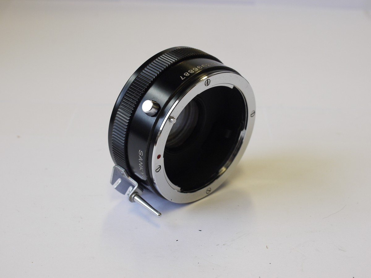 mwclassiccameras-20230707-83 Sankyo Kohki Komura Telemore 2X Convreter for Nikon F Converter + caps & case