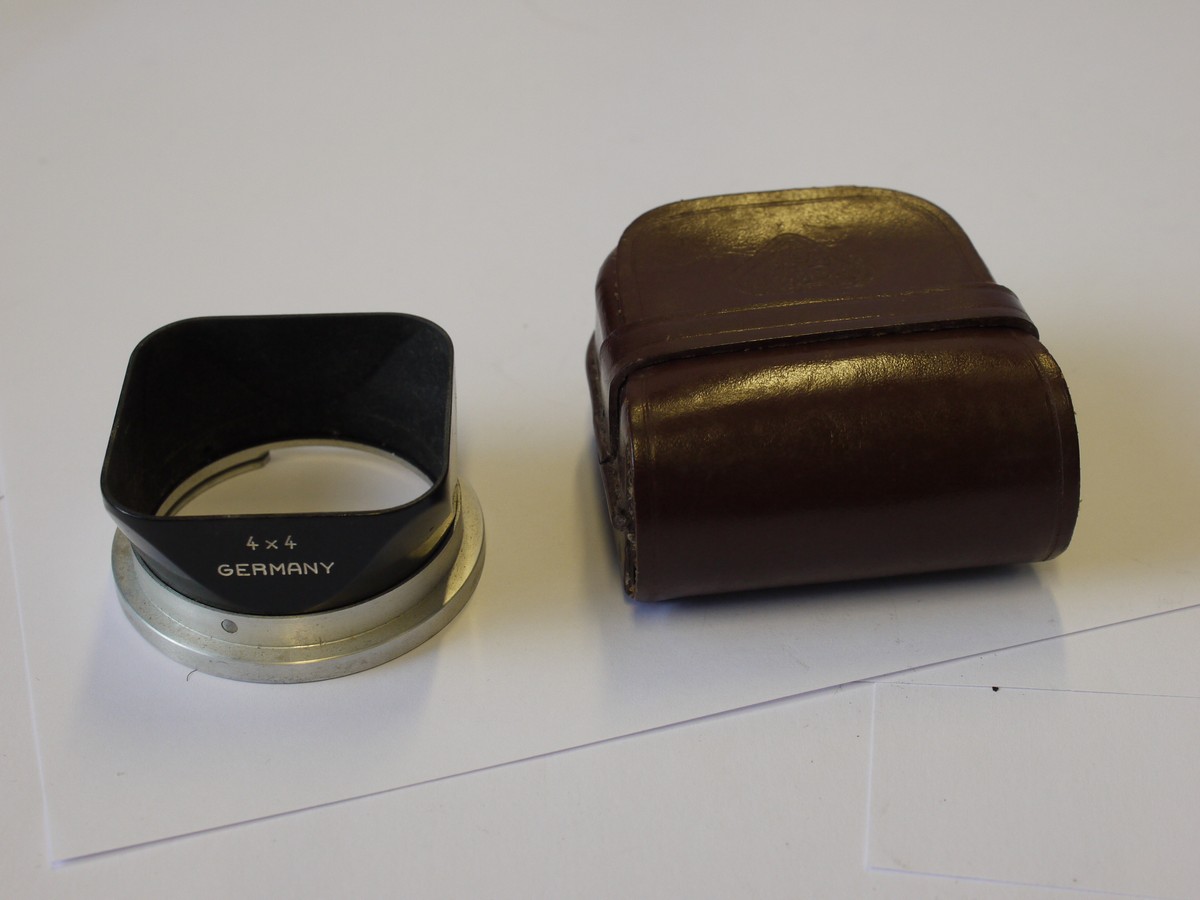 mwclassiccameras-20230811-83 Rollei Bayonet 1 metal lens hood, marked "4x4", for the Rolleiflex Baby BLACK POST-WAR TLR, with leather case. RARE HOOD