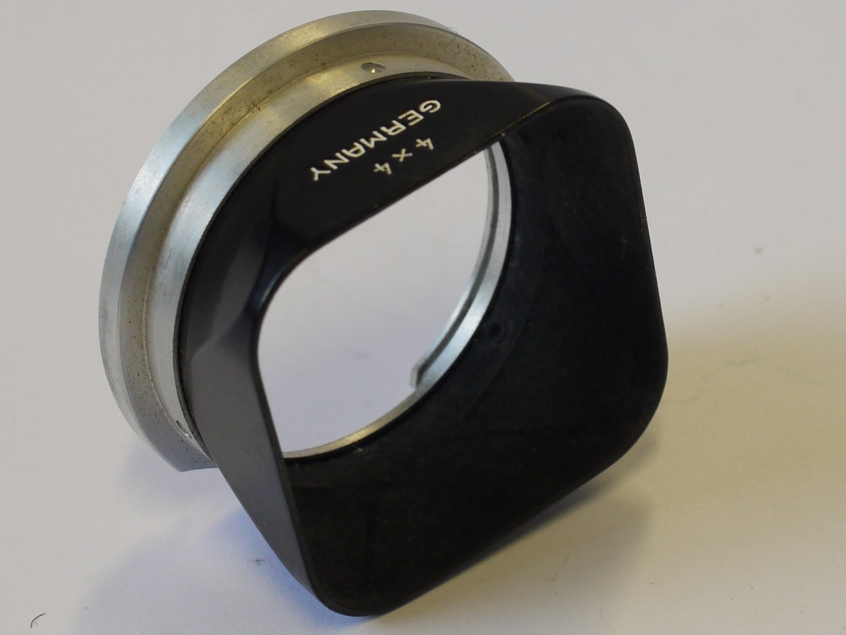 mwclassiccameras-20230811-85 Rollei Bayonet 1 metal lens hood, marked "4x4", for the Rolleiflex Baby BLACK POST-WAR TLR, with leather case. RARE HOOD