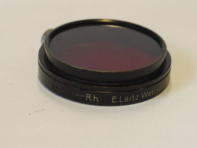 Leitz A36 Dark Red filter black rim, with fixing screw