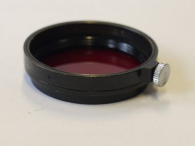 Leitz A36 Dark Red filter black rim, with fixing screw