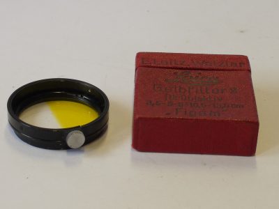 Leitz A36 Half Yellow, half clear filter, black rim, with fixing screw + Leitz Red Box