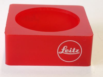 Leitz "Leica" dark red perspex lens display stand for lens diameter 60mm (82 x 82 x 30mm) Article Nr.940161
