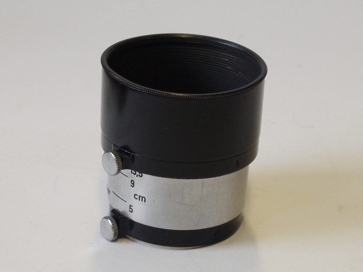 mwclassiccameras-20230825-92 Leitz A36 push-on Multi-Lens Hood, black & bright chrome, for 50-135mm lenses, with fixing screw (FIKUS)