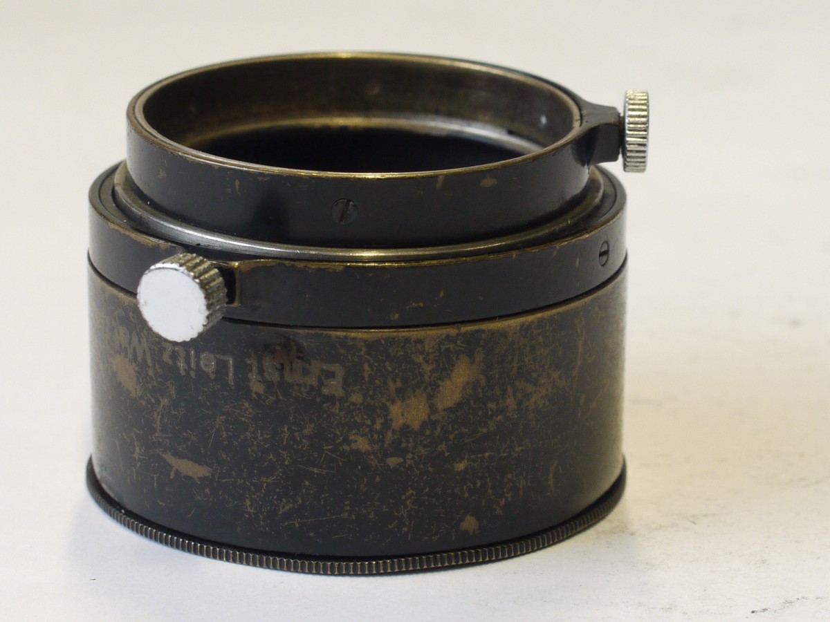 mwclassiccameras-20230901-249 Leitz A36 push-on black & nickel multi-lens hood for 3.5cm Elmar, 5cm Hektor & 50-135mm L39 lenses (FIKUS) Rare nickel hood