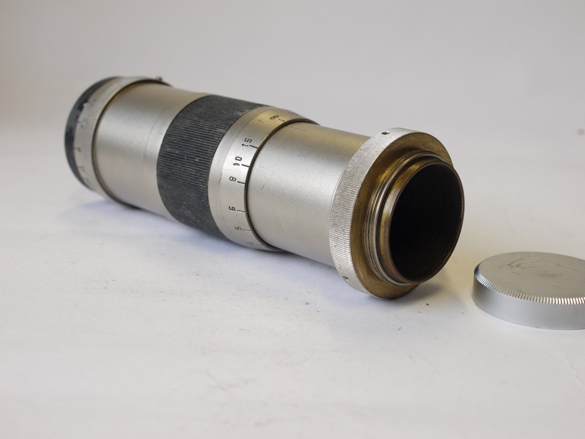 mwclassiccameras-20230908-268 Carl Zeiss Jena 15cm f4.5 Tessar uncoated brass chrome plated lens, in Leica L39 Rangefinder coupled screw mount + rear cap. RARE EARLY LEICA COUPLED LENS
