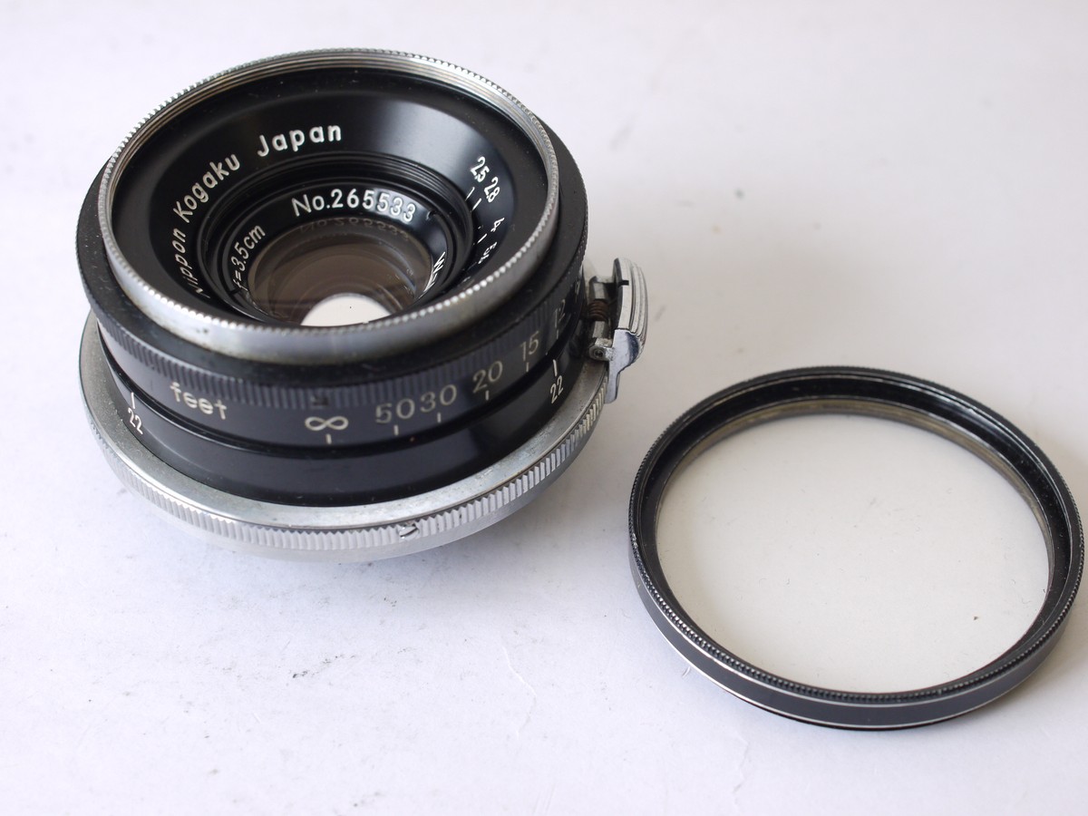 mwclassiccameras-20230908-308 Nikon Nippon Kogaku 3.5cm f2.5 W-Nikkor coated black barrel lens, Nikon S rangefinder mount + Kenko UV filter & Nikon front cap