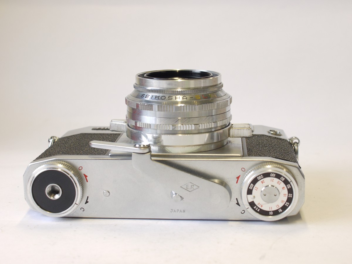 mwclassiccameras-20230908-330 Ricoh 500 c1960 35mm coupled rangefinder camera with base-winding. With Ricoh 4.5cm f2.8 Riken lens & Rex UV filter