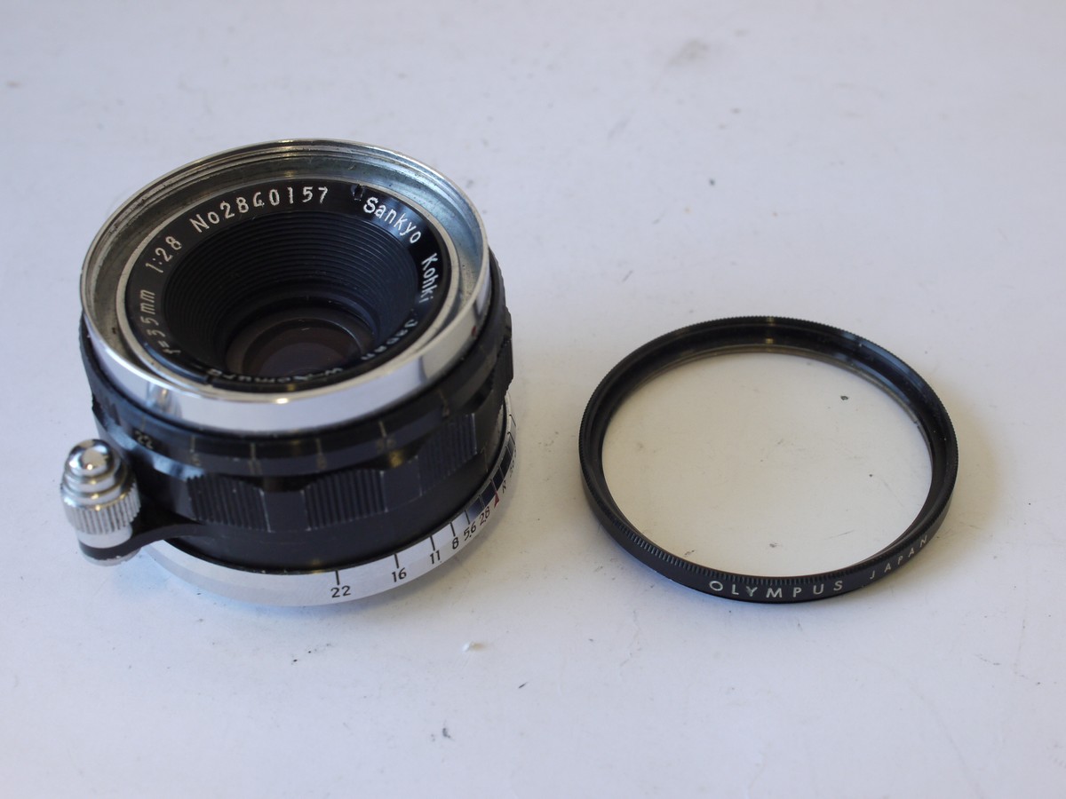 mwclassiccameras-20230915-212 Sankyo Kohki 35mm f2.8 W-Komura coated black L39 Rangefinder coupled screw mount lens