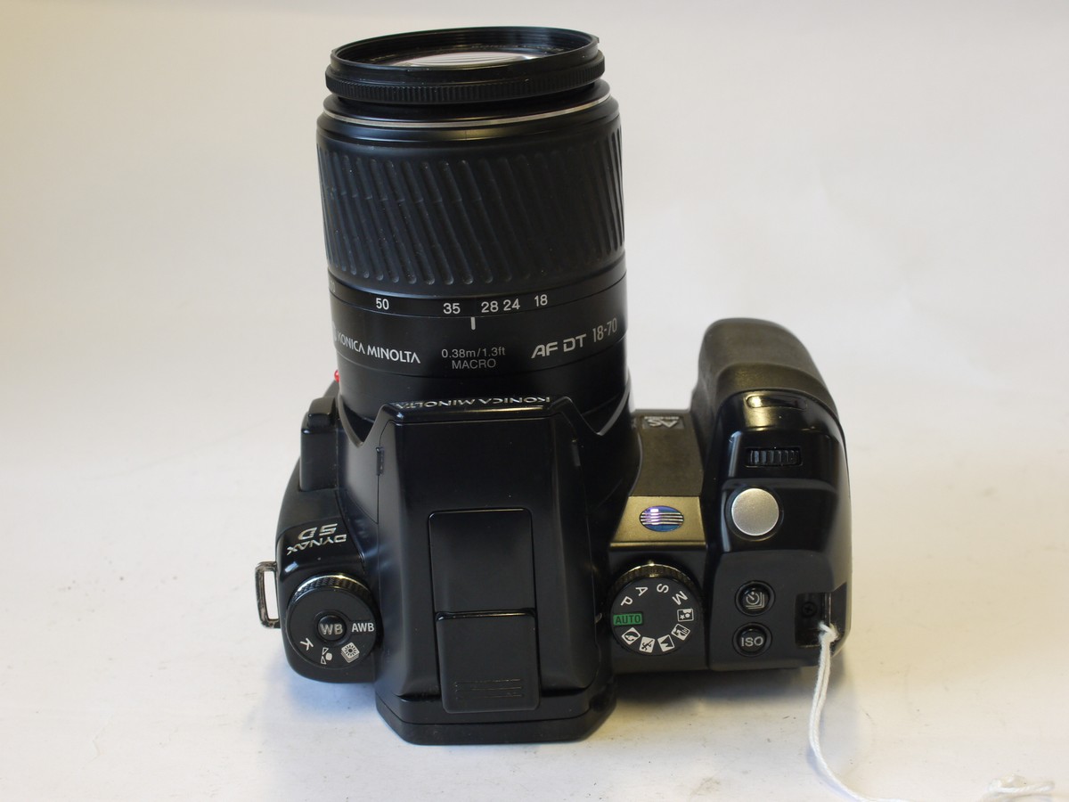 mwclassiccameras-20230915-263 Konica Minolta Dynax 5D 6.1MP DSLR + 18-70mm f3.5-5.6 AF DT Zoom, front cap, USB lead, strap & instructions