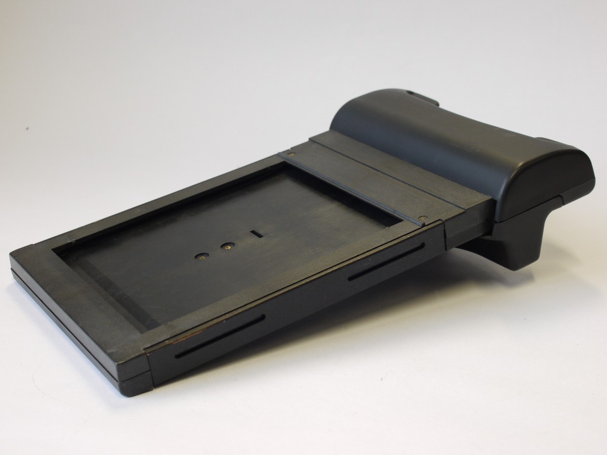 mwclassiccameras-20230922-120 Polaroid 545i Film back, complete with set of five Polapan Pro 100 instrant films, 100 ISO, unsued in wrapping