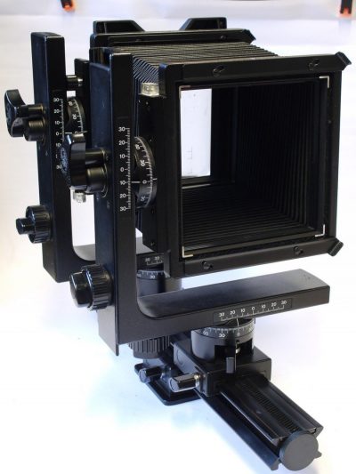 Horseman 5x4 Monorail camera. Tripod mount. Rail, Front Standard, Rear Standard with glass back/spring film holder. Bellows & Flight Outfit case. Has full set of front & rear movements