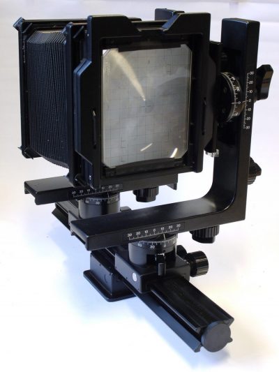 Horseman 5x4 Monorail camera. Tripod mount. Rail, Front Standard, Rear Standard with glass back/spring film holder. Bellows & Flight Outfit case. Has full set of front & rear movements