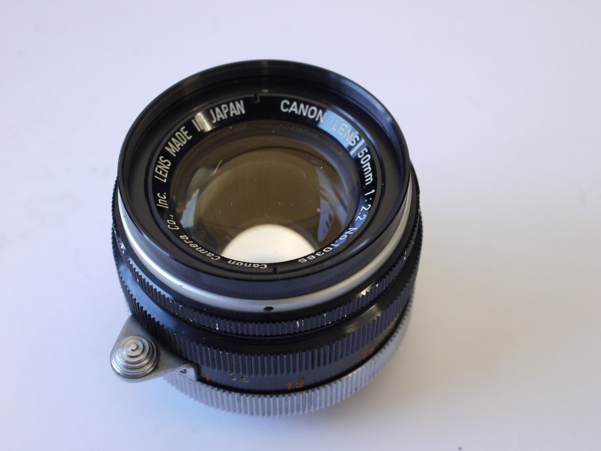 mwclassiccameras-20230922-216 Canon 50mm f2.2 black & chrome Leica L39 RF screw mount lens + Canon front cap & a rear cap