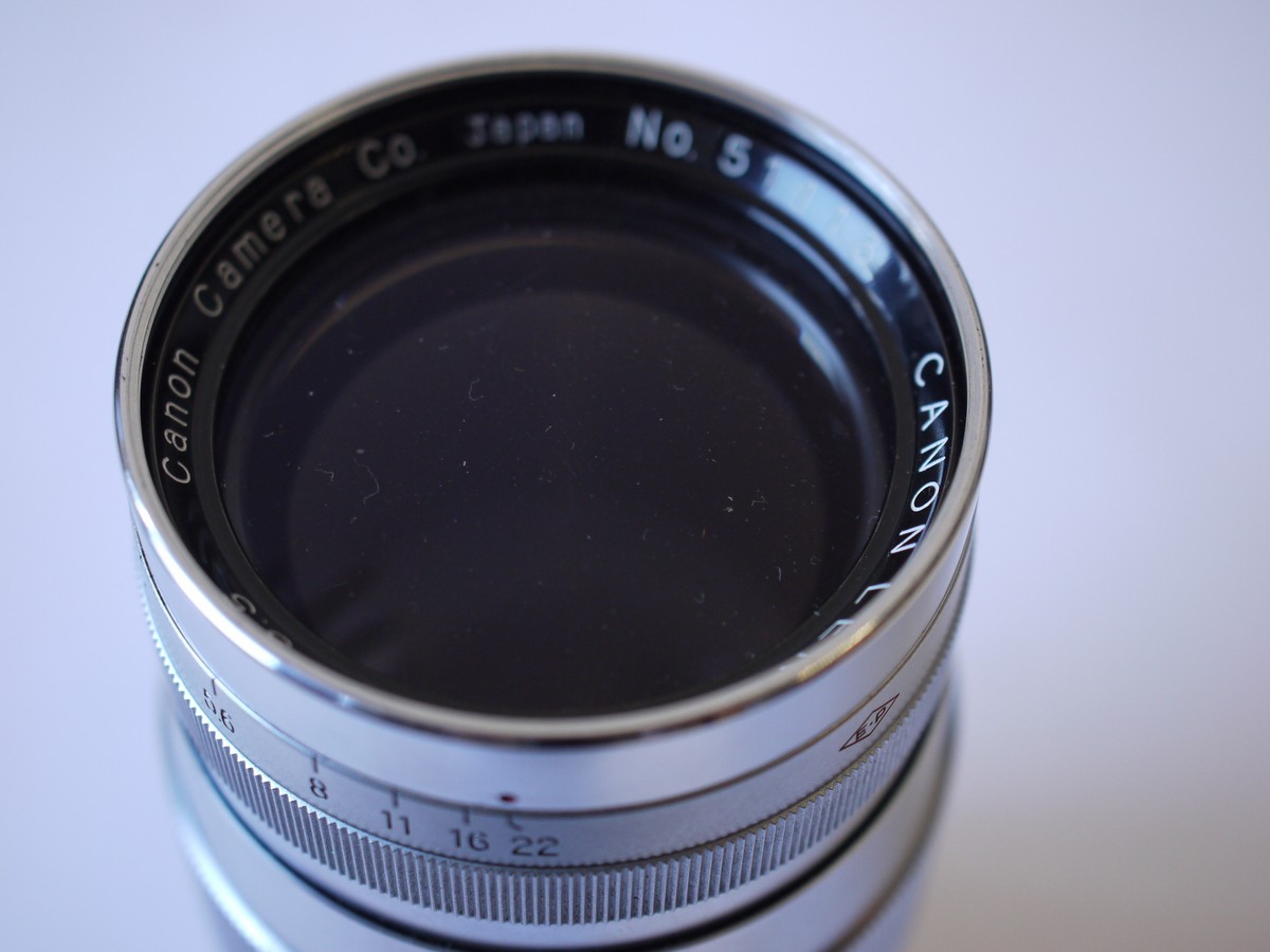 mwclassiccameras-20230929-20 Canon 135mm f3.5 All chrome lens, L39 Rangefinder coupled, with Canon 48mm UV filter, Series 7/48mm adapter ring, makers Series VII lens hood & rear cap