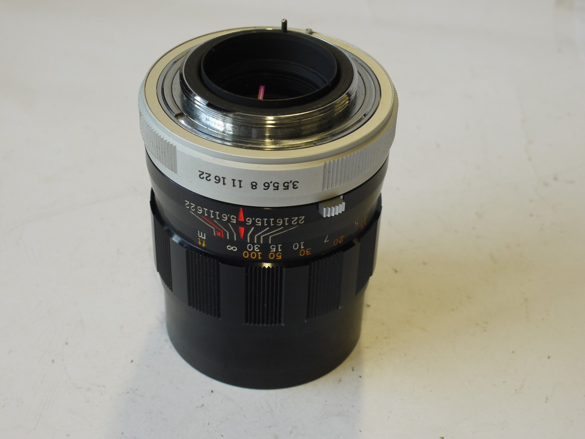 mwclassiccameras-20231006-191 Olympus 135mm f3.5 E Zuiko M42 screw mount lens (for Olympus FTL SLR camera) + makers caps. UNCOMMON