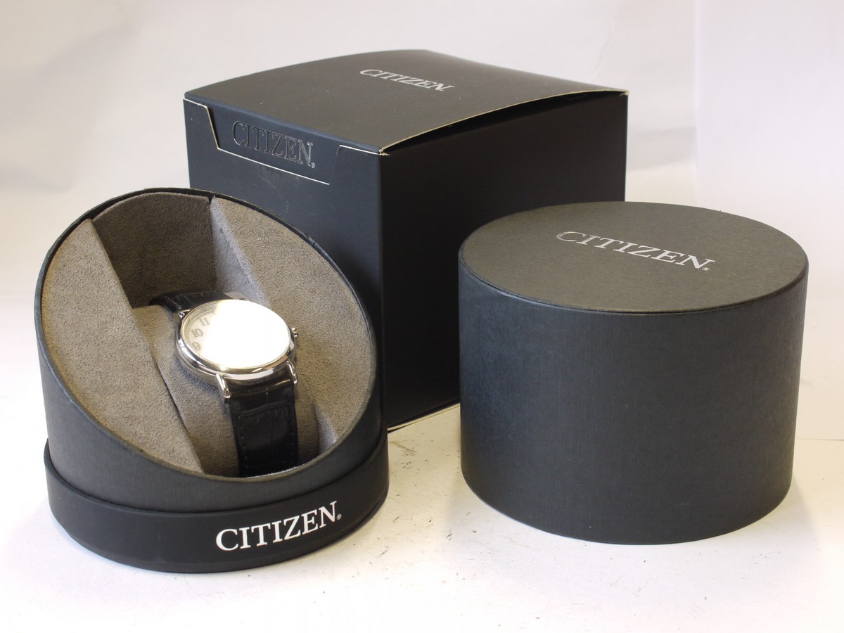 mwclassiccameras-20231013-370 Citizen Eco Drive wrist watch, white face, stainless steel bezel, black strap. With presentation box