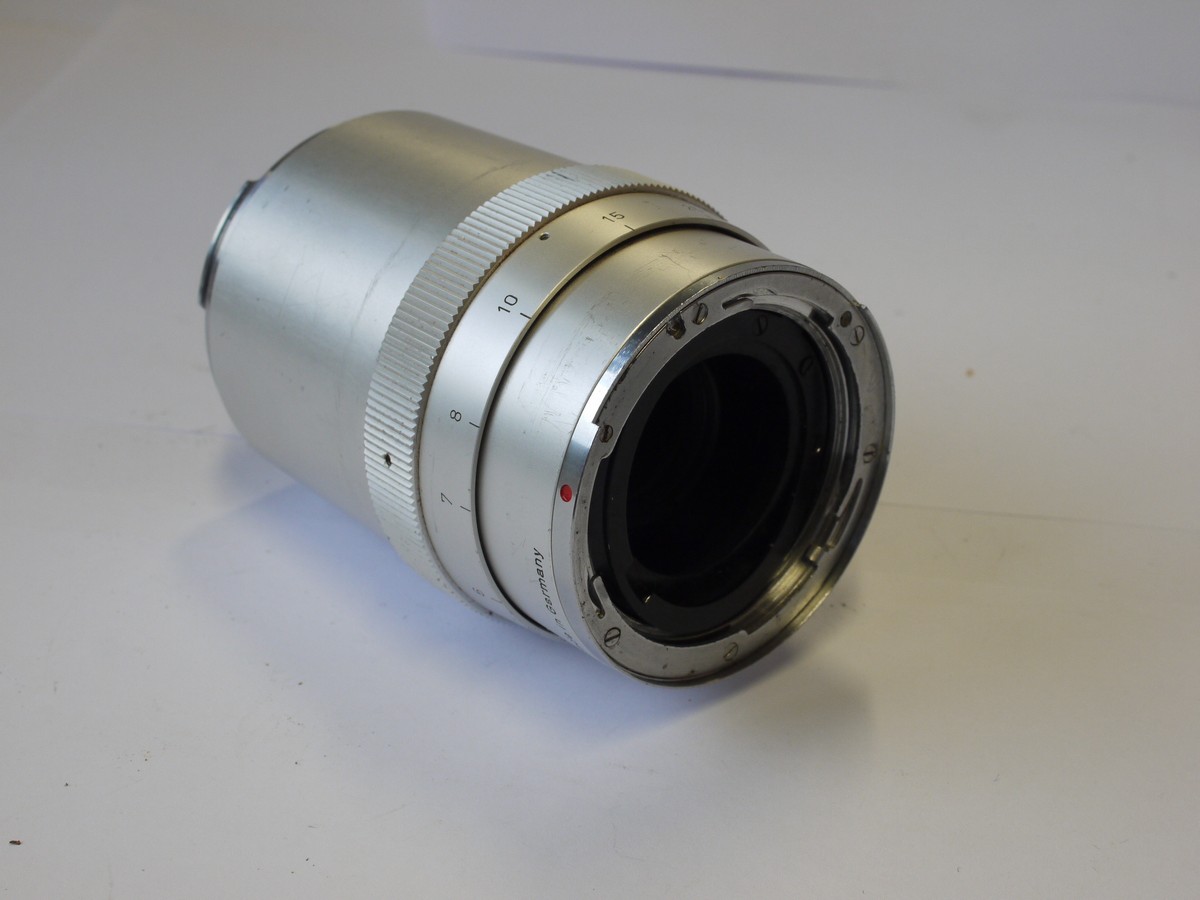 mwclassiccameras-20231027-318 Carl Zeiss 135mm f4 Sonnar chrome Contarex lens + Zeiss bayonet front cap