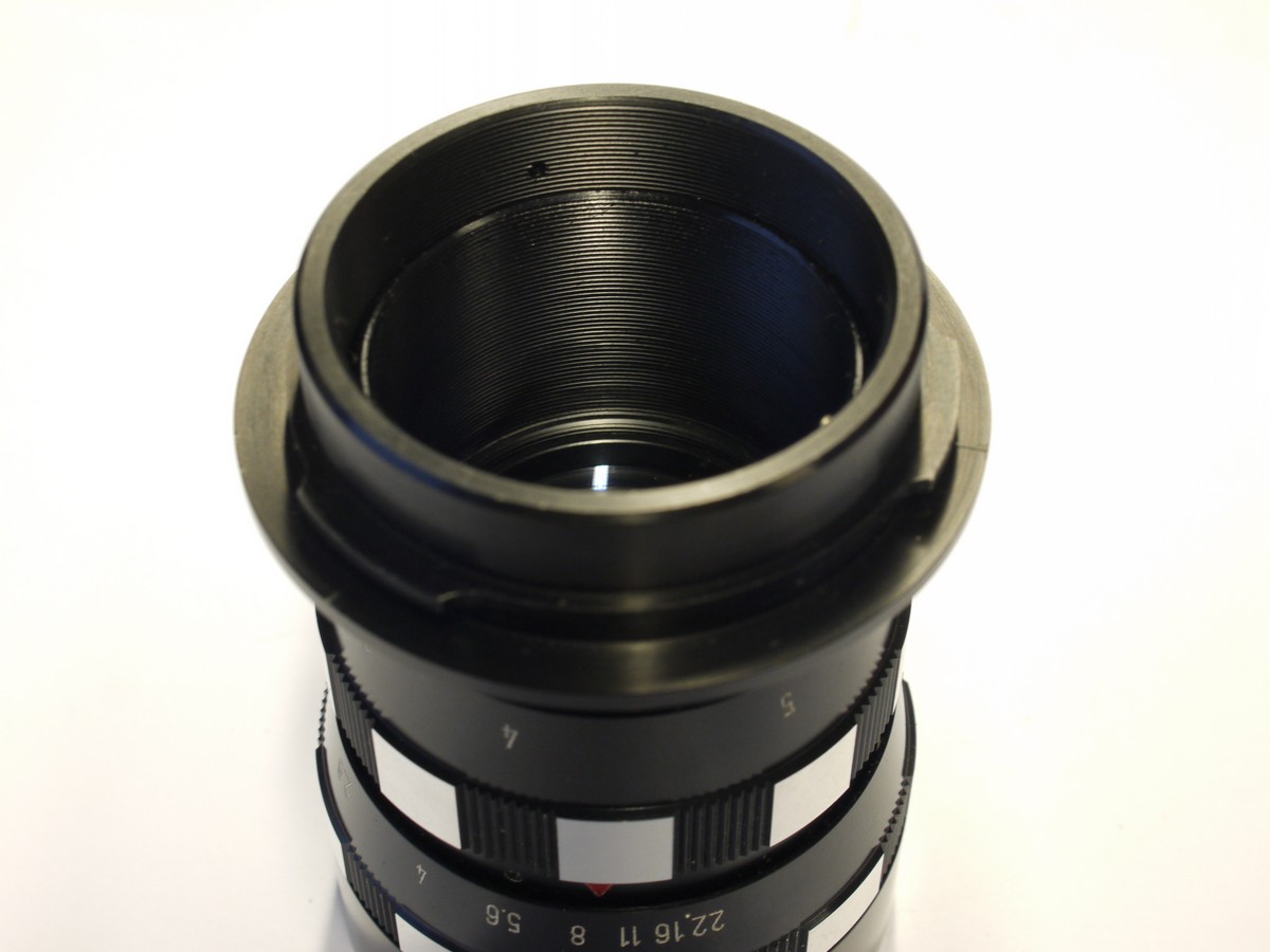 mwclassiccameras-20231103-472 Enna Munchen 95mm f2.8 Ennalyt coated manual focus Praktina mount lens + makers keeper case