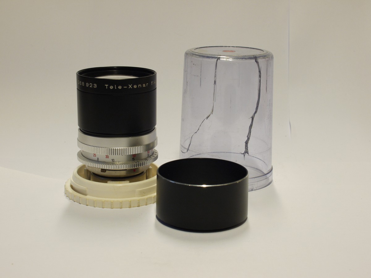 mwclassiccameras-20231103-505 Schneider 135mm f4 Tele-Xenar lens for Retina Reflex 3/4/S, short thin type, chrome & black + black lens hood & keeper case