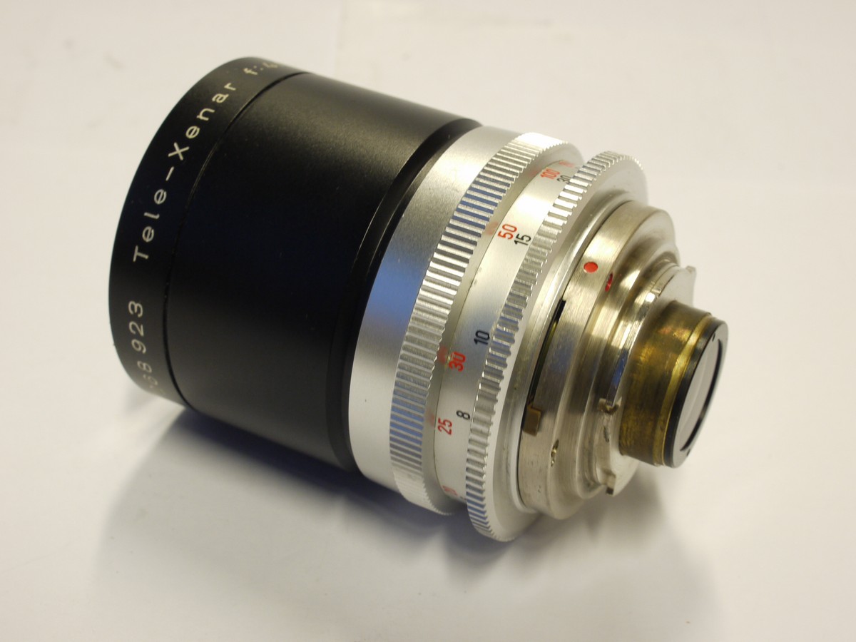 mwclassiccameras-20231103-509 Schneider 135mm f4 Tele-Xenar lens for Retina Reflex 3/4/S, short thin type, chrome & black + black lens hood & keeper case