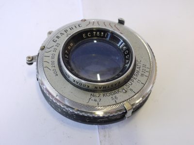 Kodak 127mm f4.7 Ektar coated lens with Iris Diaphragm, Graflex front face surround panel & Kodak Supermatic shutter