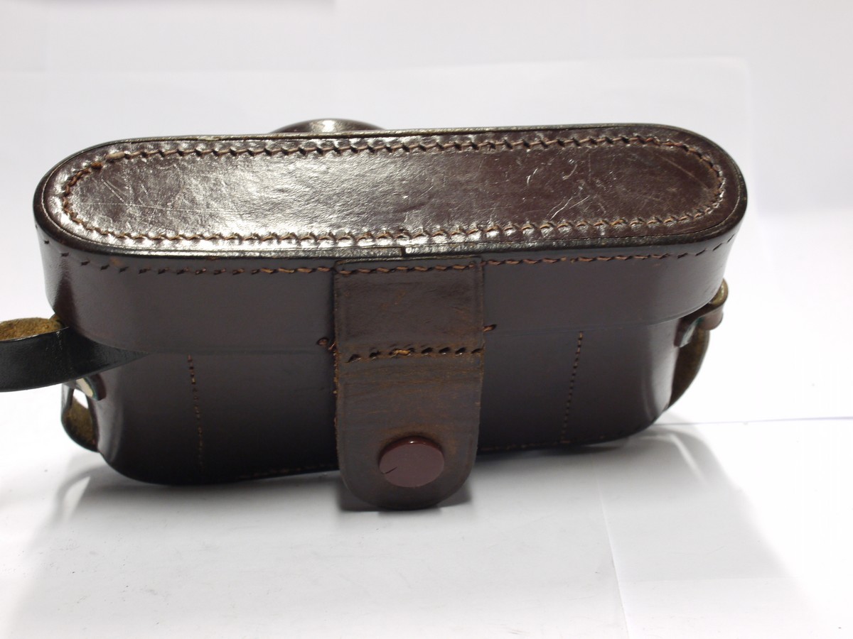 mwclassiccameras-20231110-436 Unamed leather ER case for Leica L39 cameras, with small tripod mount & long nose front. With strap