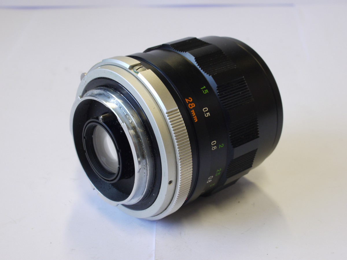 mwclassiccameras-20231110-97 Minolta 28mm f2.5 MC W.Rokkor-SI manual focus MC mount lens + Minolta caps