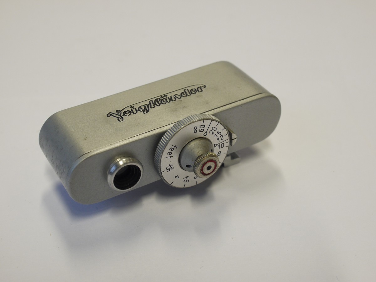 mwclassiccameras-20231117-209 Voigtlander short base shoe rangefinder, scale in feet. With Voigtlander leather case