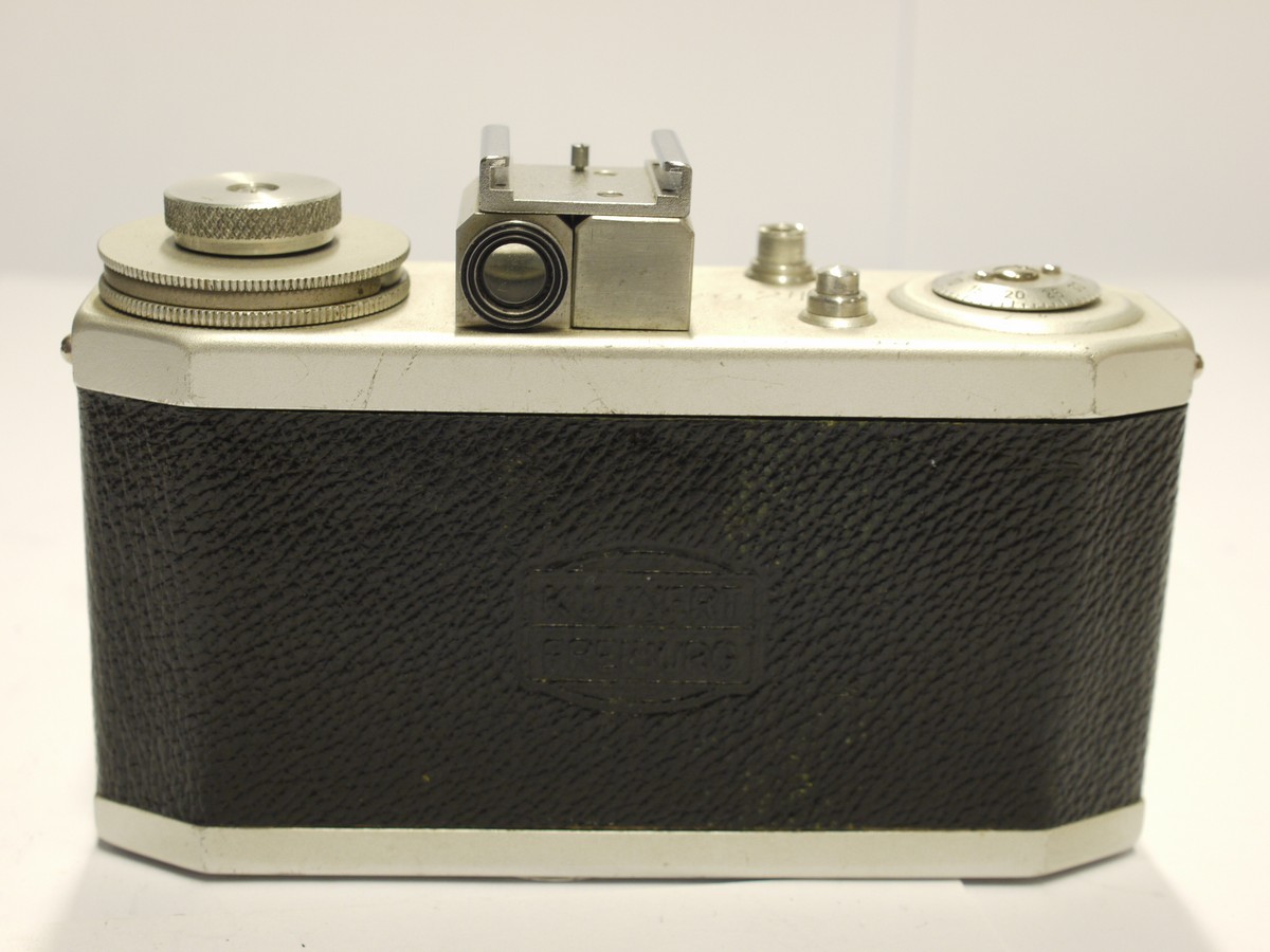 mwclassiccameras-20231117-285 Fritz Kuhnert Freiberg (Futura) Efka 24 c1947 24x24 on 35mm viewfinder camera, with retractable rapid-wind lever & 4cm f2.8 Elor lens with behind-the-lens Compur-Rapid shutter. Has accessory shoe added to top. UNCOMMON