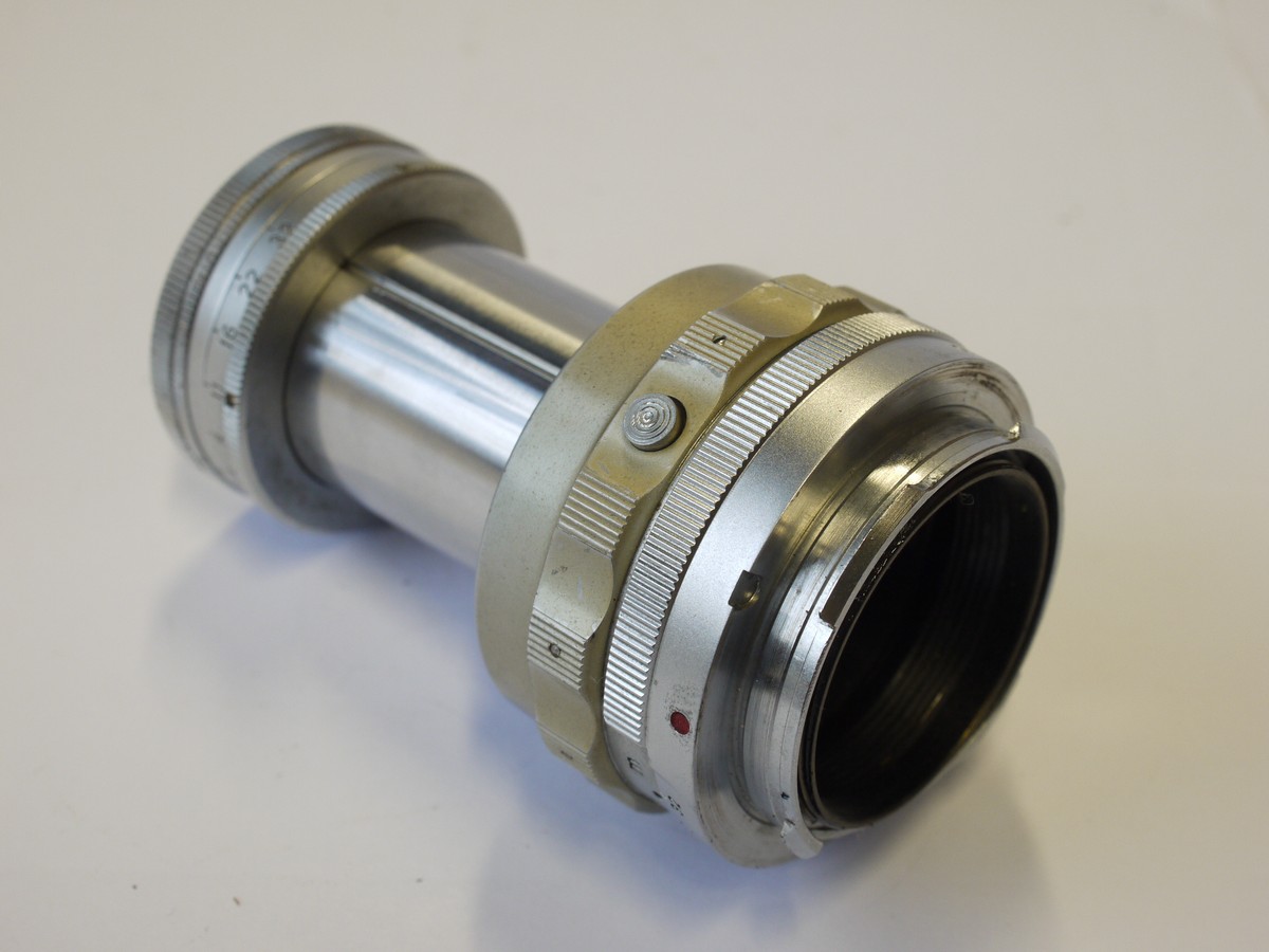 mwclassiccameras-20231117-88 Leitz Wetzlar 9cm f4 Elmar-M chrome, collapsible lens (No.1138099) + Leitz front cap & keeper case