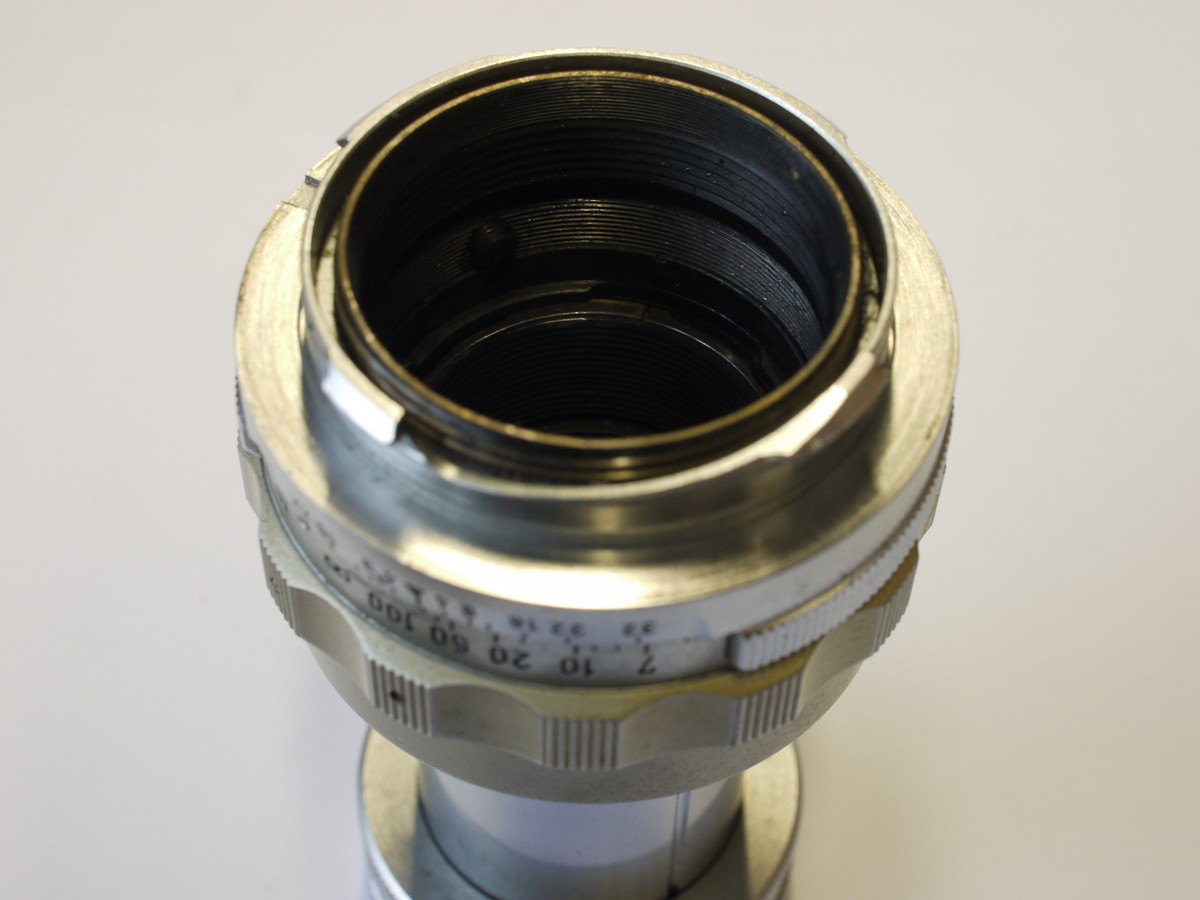 mwclassiccameras-20231117-90 Leitz Wetzlar 9cm f4 Elmar-M chrome, collapsible lens (No.1138099) + Leitz front cap & keeper case
