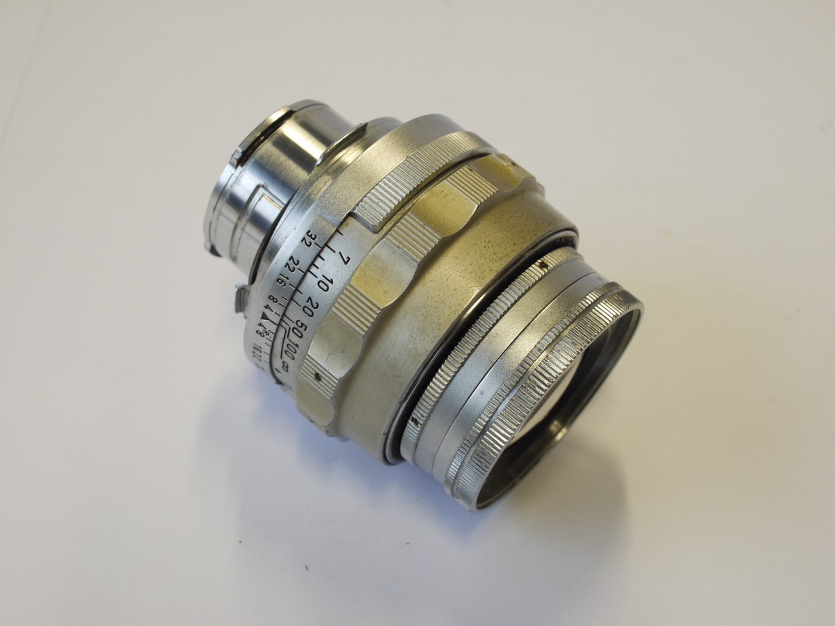 mwclassiccameras-20231117-91 Leitz Wetzlar 9cm f4 Elmar-M chrome, collapsible lens (No.1138099) + Leitz front cap & keeper case