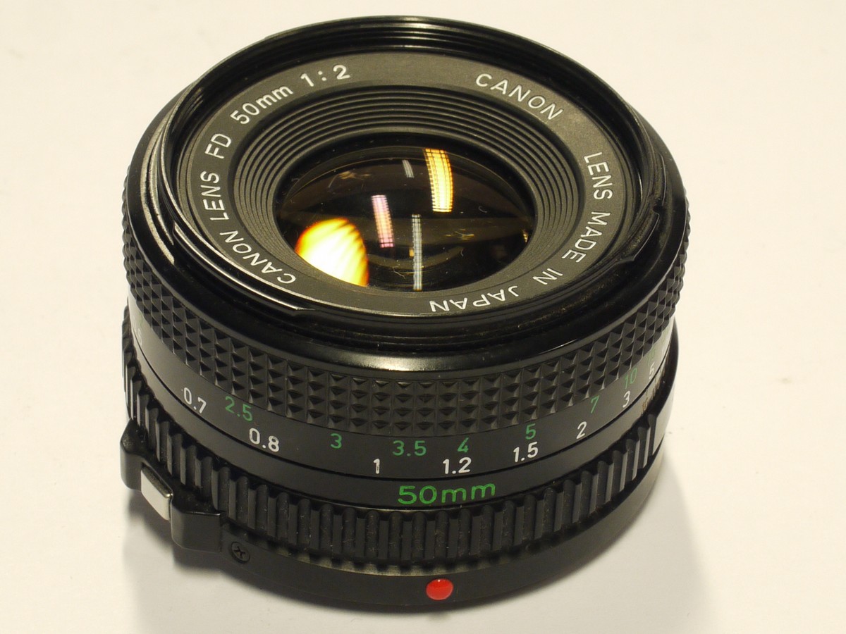 mwclassiccameras-20231124-295 Canon 50mm f2 manual Focus FD moun t lens + Canon caps