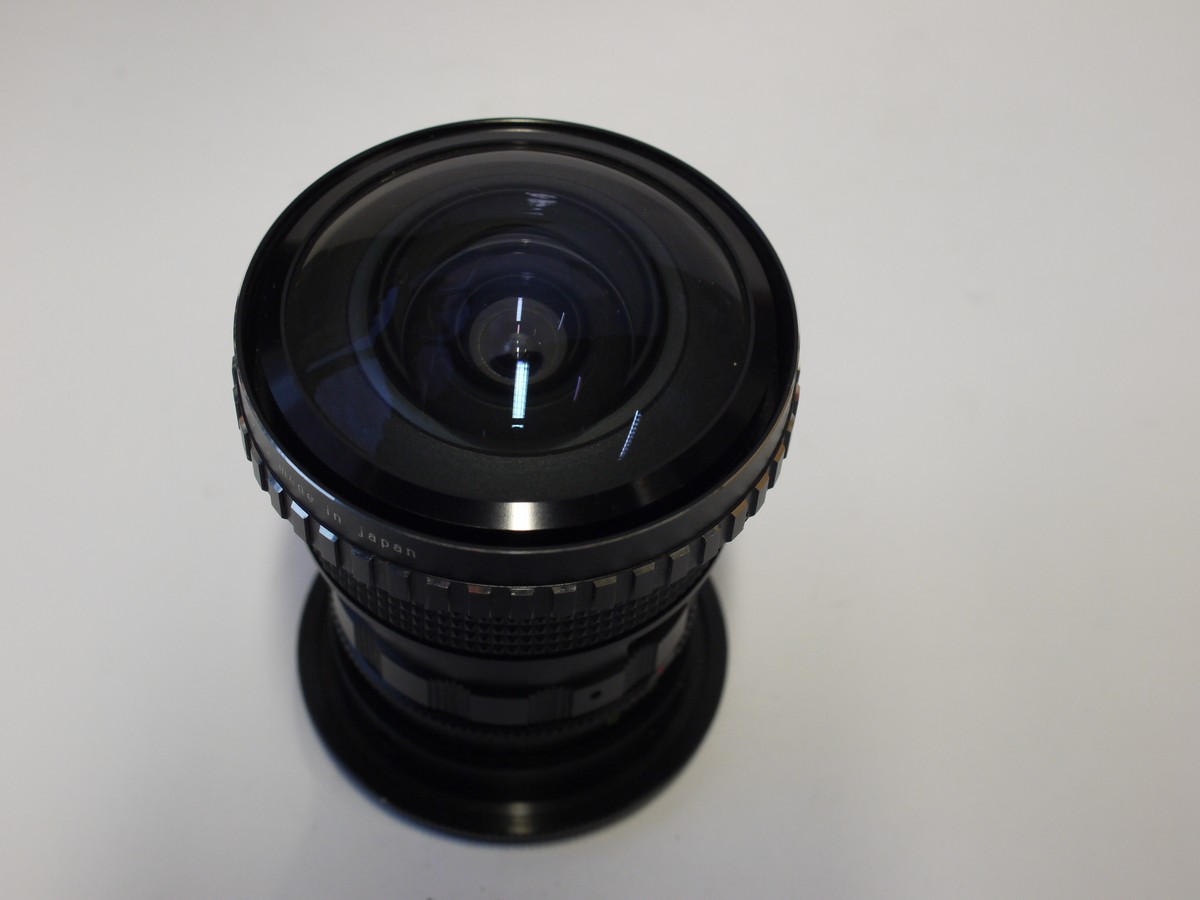 mwclassiccameras-20231208-170 Soligor 0.15X Fish-Eye Conversion lens + 55mm filter adapter ring + makers front cap