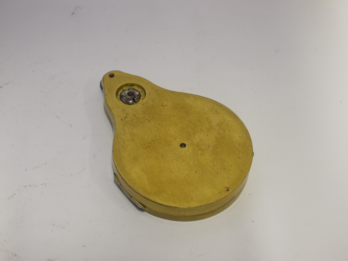 mwclassiccameras-20231208-218 Chartometer (Morris's Patent) brass, Victorian, with hinged glass for inserting card dials. Comes with set of Nine scale discs (Miles, furlongs etc) for matching to different map scales. In makers case