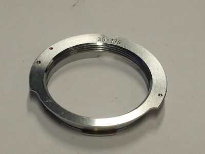 Unamed L39 screw lens to M bayonet camera mount adapter, setting for 35 & 135mm M camera frames
