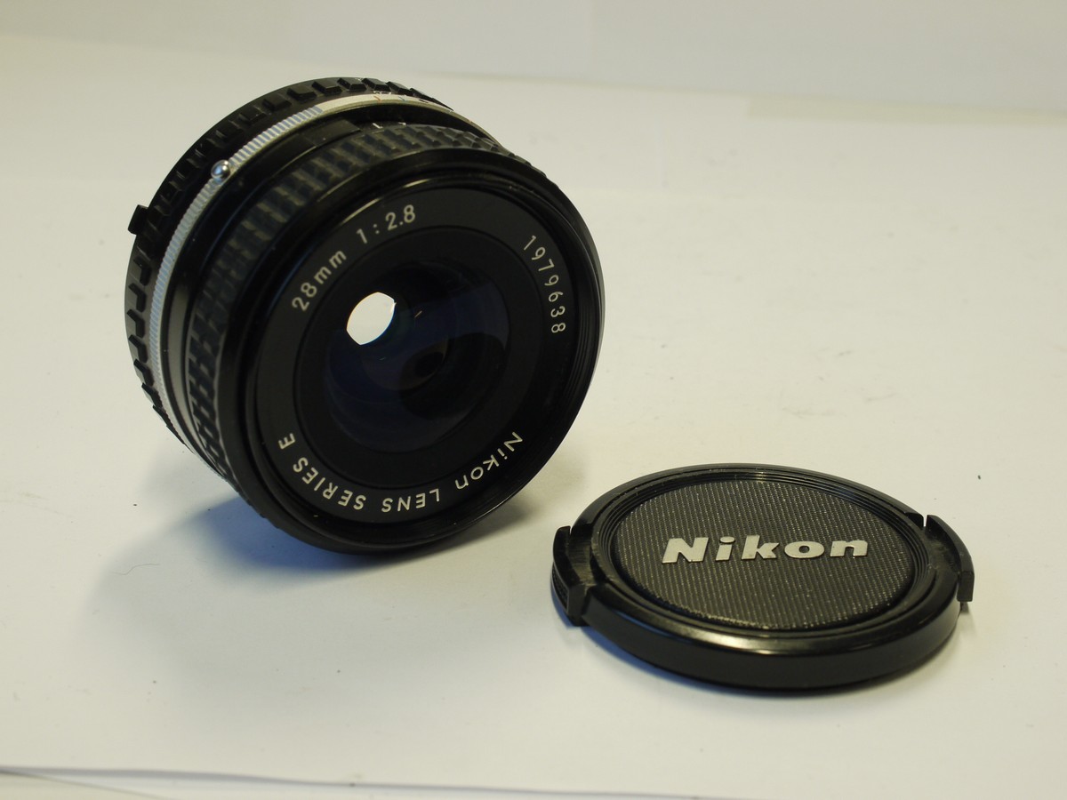 mwclassiccameras-20240112-175 Nikon Series E 28mm f2.8 manual focus AIS mount lens + Nikon front cap