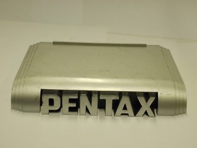 Pentax Silver coloured Plastic camera stand (170 x 135 x 28mm)