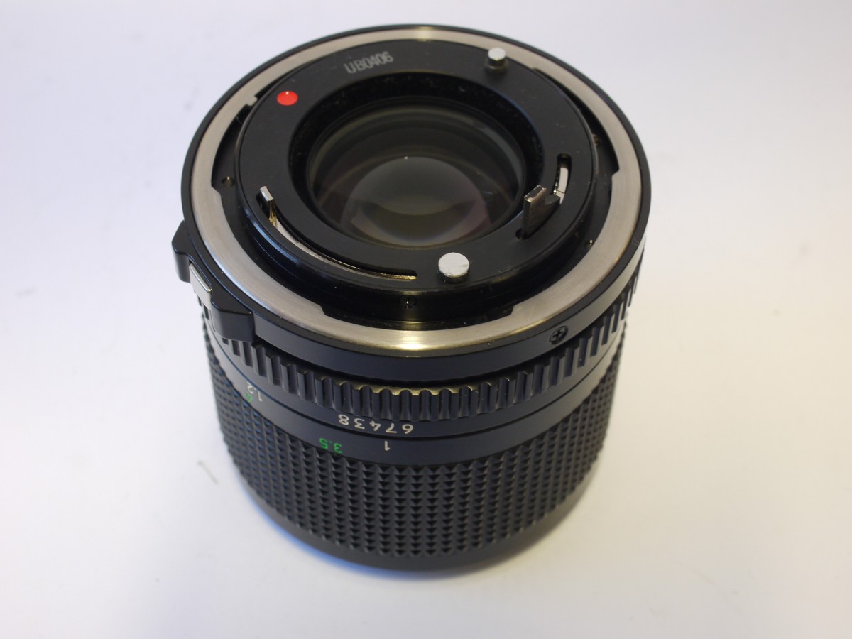 mwclassiccameras-20240119-305 Canon 100mm f2.8 manual focus FD mount lens + Canon caps. Canon BS-52 les hood, Instructions, wrranty caprd & box with packaging
