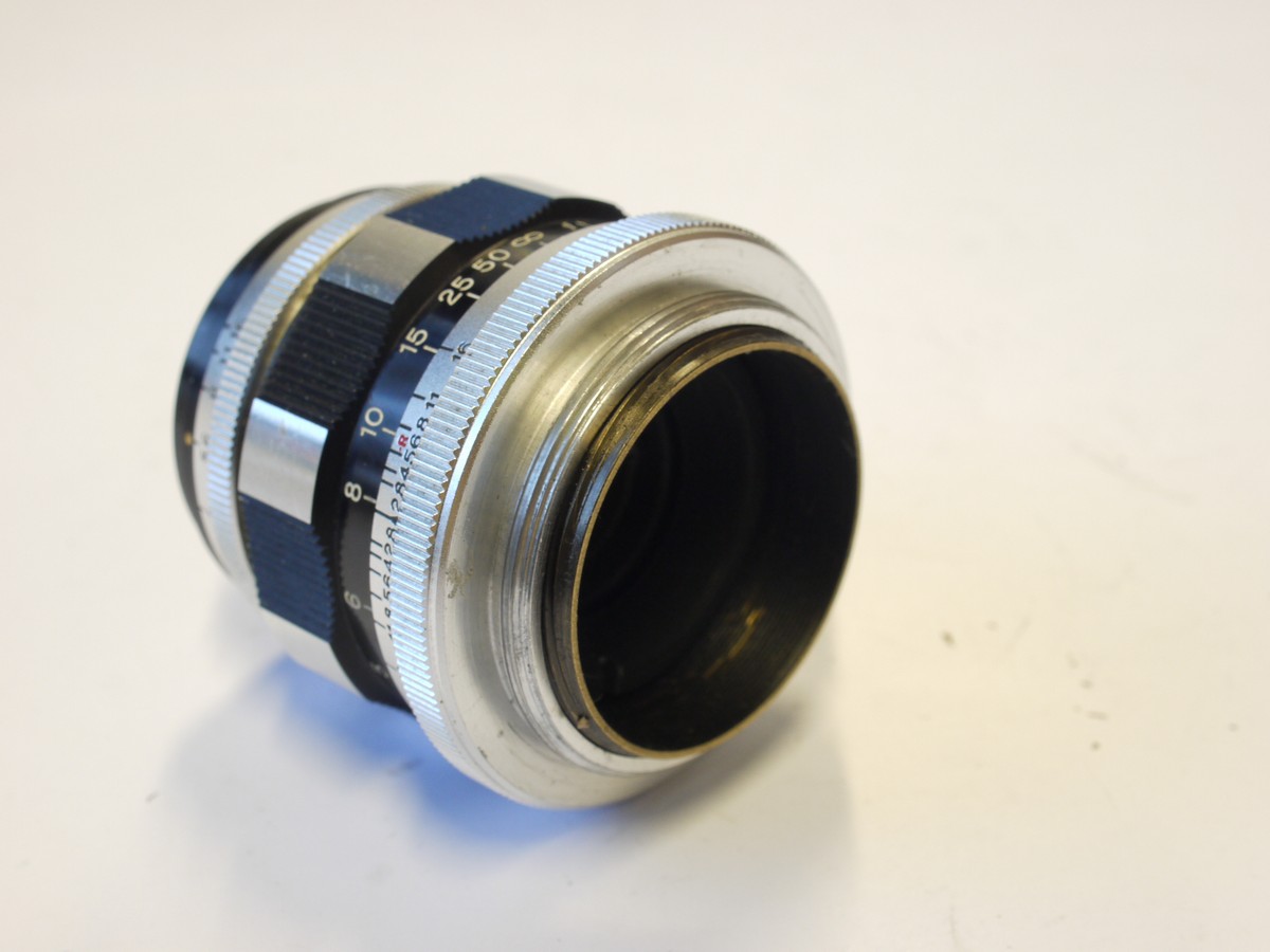 mwclassiccameras-20240119-315 Canon 50mm f2.8 black & chrome Leica L39 rangefinder coupled screw mount lens + Canon 36mm Push-on black metal lens hood. UNCOMMON