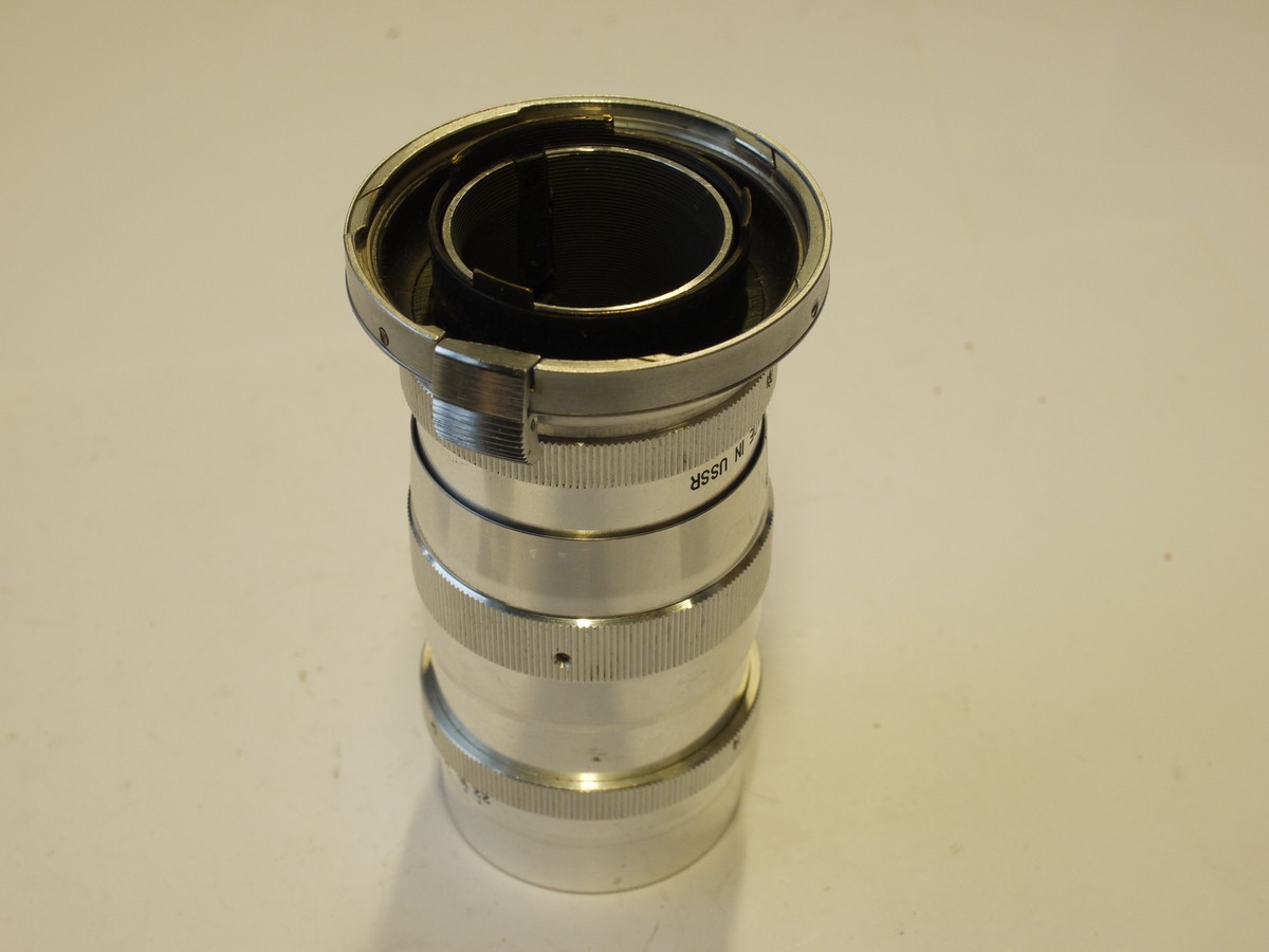 mwclassiccameras-20240126-339 Krasnagorsk 135mm f4 Jupiter-11 chrome lens in Kiev 3/4 bayonet mount + caps & Bakelite keeper case