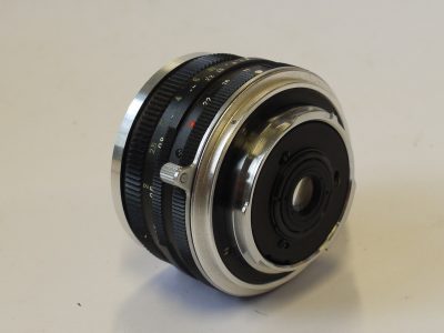 Minolta 35mm f4 W Rokkor-QE  manual focus MX Early lens for Minolta SLRS + Minolta Push-on metal lens hood (D57HB)