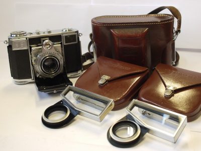 Canon Powershot G12 Digital Mirrorless camera with 6.1-30.5mm f2.8-4.5 IS 5X lens, Canon Battery (No charger) & Independent made brown case