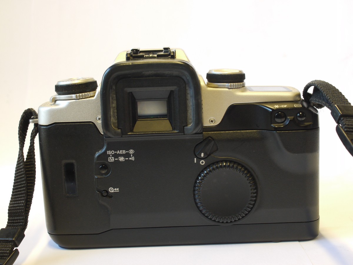mwclassiccameras-20240216-294 Canon EOS 50E 35mm AF SLR, Black & Grey coloured + Sigma 28-80mm f3.5-5.6 Zoom ens, with front cap, instructions & Canon neck strap